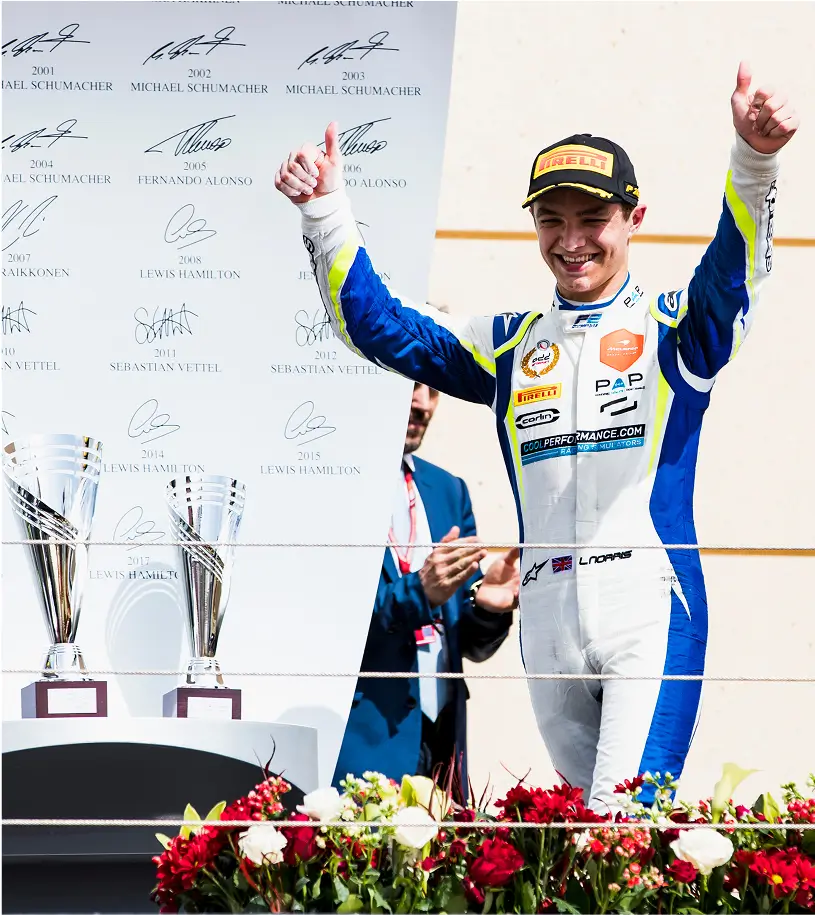 Lando celebrating junior career win